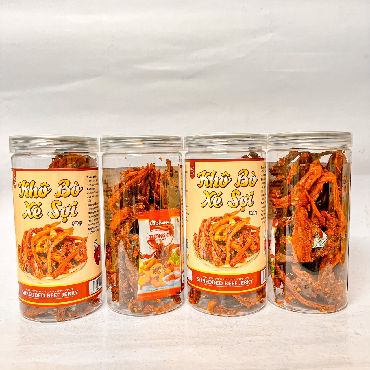 22517-z4827113383807-04687d2a329005e9ba7f1dc489b9d075-5.jpg Khô Bò Xé Sợi Loại Ngon 300g hộp - KBXS