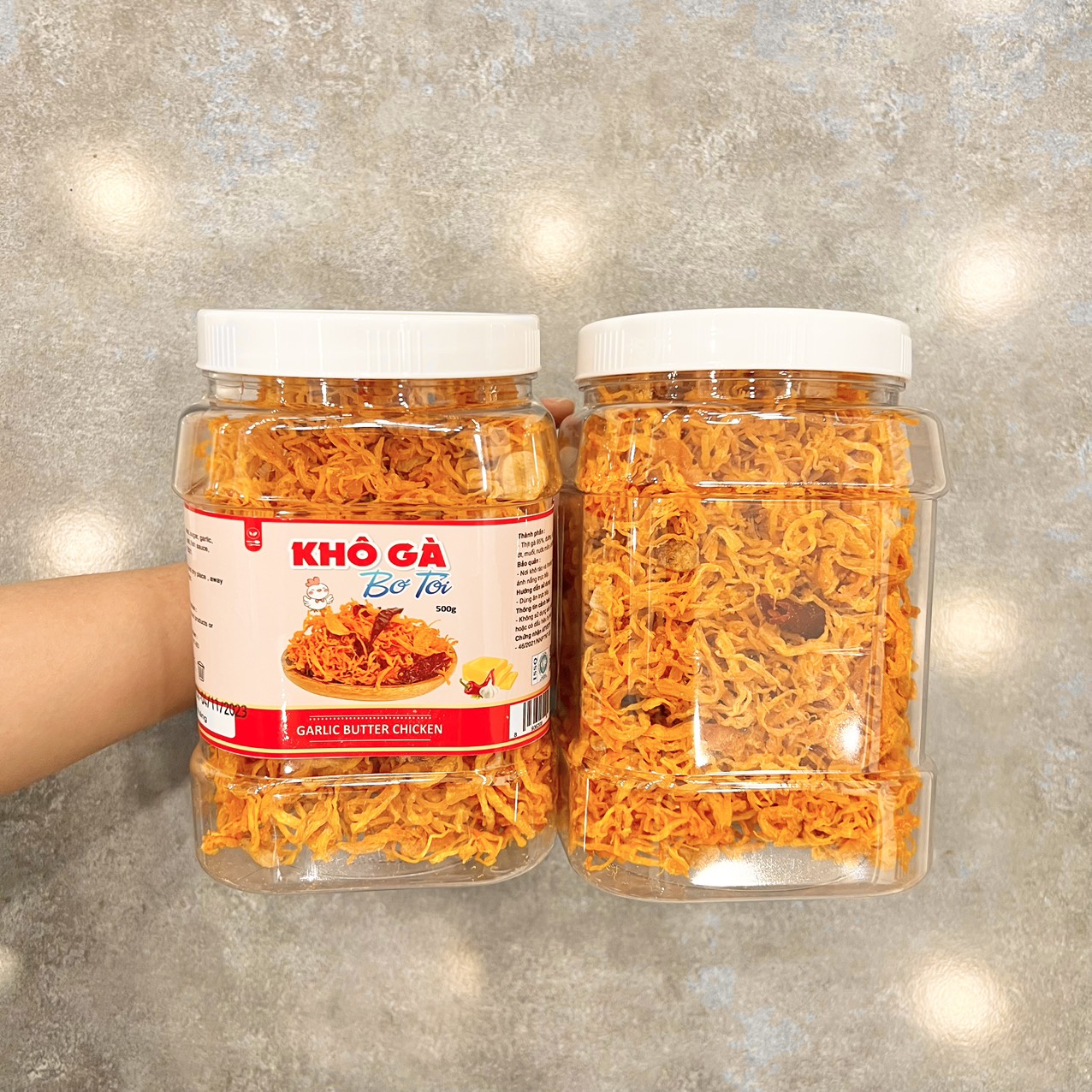 Nguồn sỉ khô Gà Bơ Tỏi Thơm Ngon 500g hộp Nguồn sỉ khô Gà Bơ Tỏi Thơm Ngon 500g hộp