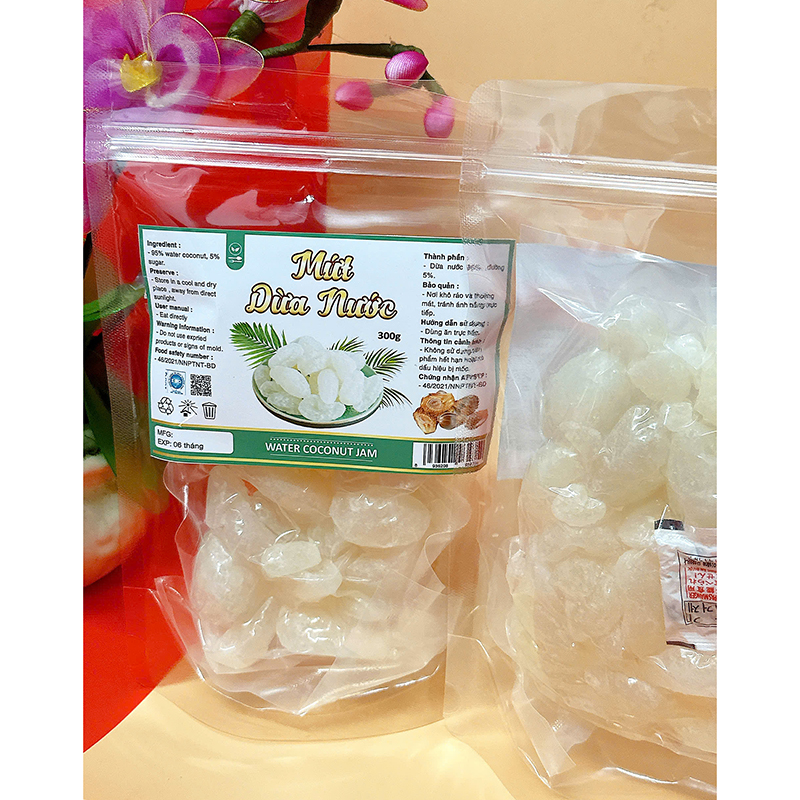 23385_z6125806461374-7e65ba618d7975c58684ac51fe6573be_20241214111449-2.jpg Mứt Dừa Nước Túi Zip 300g - MDNHCK