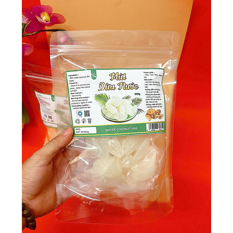 23385_z6125806478109-2a5baeaa44af32c0a8999e09fe071a6c_20241214111450-2.jpg Mứt Dừa Nước Túi Zip 300g - MDNHCK