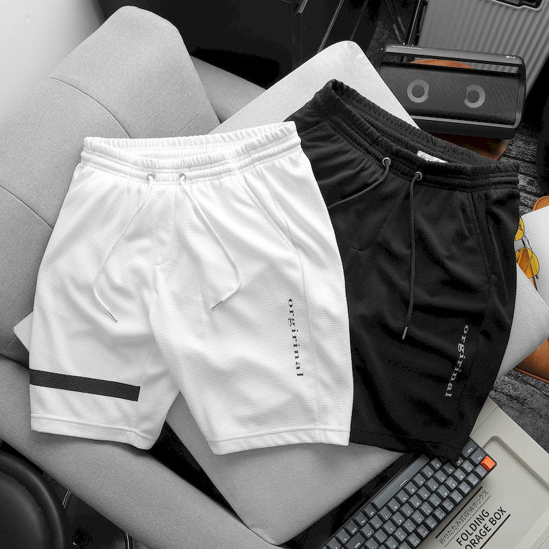 23853_z5313249312087-cf62f1614185de2c7532d25462bb6a67_20240404033747.png Quần Short Thun Nam Viền Sọc In Chữ Orgirinal - QB426