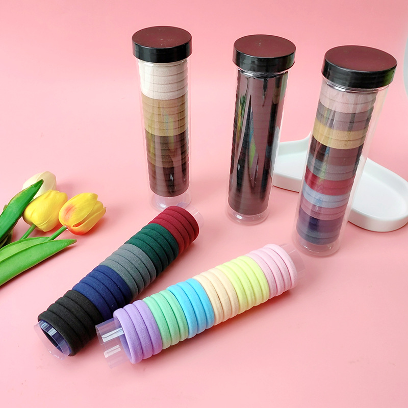 24563_f6f52f11988f0b041727e8d2f38cb5d5_20240617144929-2.jpg Combo 3 Dây Thun Cột Tóc Co Giãn Mềm Mại - Hộp 20 Dây Thun Buộc Tóc Trơn - Giao Ngẫu Nhiên Hộp 19.5cm - CBCOTTOC01