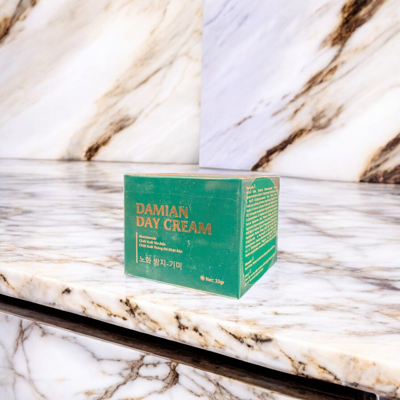 25008_z5800370992948-00ccaec08f9a40419ce84c4d42cd8791-photoroom_20240905173211-2.jpg Kem Face Hỗ Trợ Dưỡng Trắng Da Ban Ngày Damian 33gr - 8938555293016