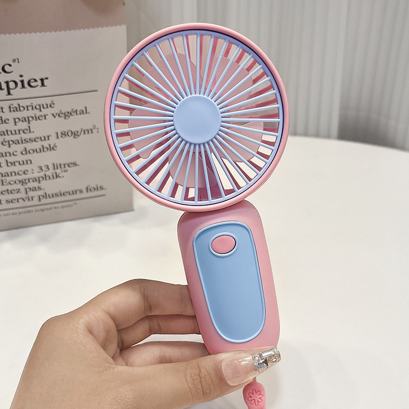 25107_o1cn01hgysiq1dyhzyu4f7t-2216563593804-0-cib_20240919144104-3.jpg Quạt Mini Cầm Tay Kèm Stiker 7.5x15x5.5cm - QMNCTHF01
