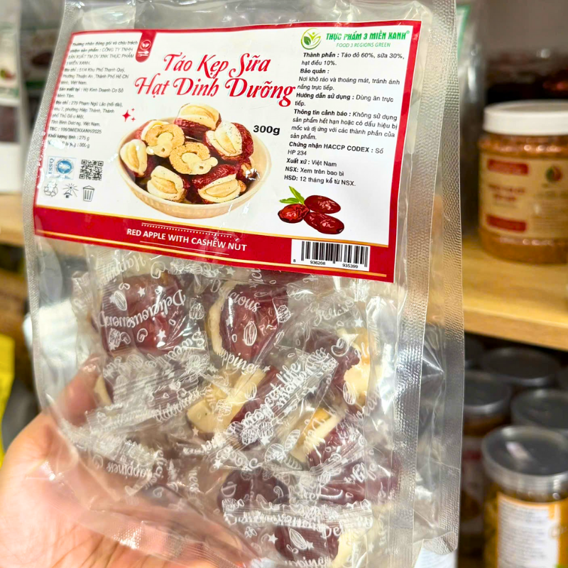 25878_56_20251204175119-3.png Táo Đỏ Kẹp Hạt Điều Túi Zip 300g - TDKHDTZ300