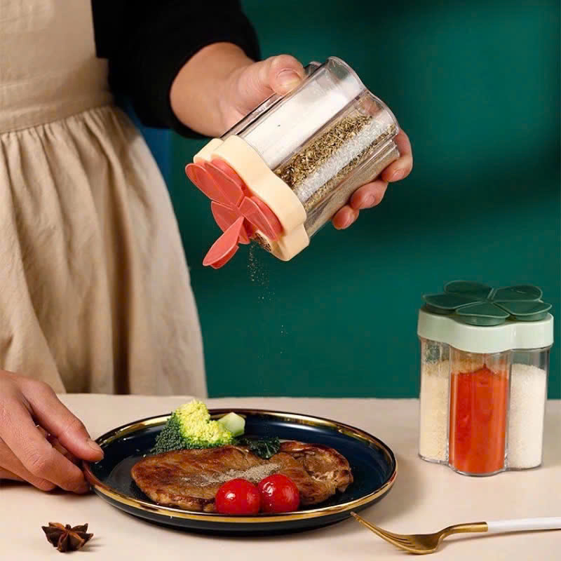 26067_z6251579416438-c281c94dd07b92fd54372aec2850d392_20250124143808-2.jpg Hũ Đựng Gia Vị Nhựa Cao Cấp - Lọ Gia Vị 5 Ngăn Hình Hoa 9x11cm - DGV01